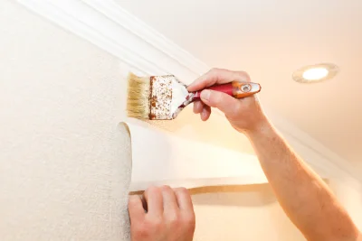 Pose de papier peint à Parmain — revêtements muraux et toiles de verre